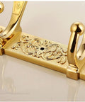 Sleek European Style Golden Coat Hook For Bathroom And Entryway Built Tough Wall Hanging Clothes Rail With Smooth Carved Details Premium Wall Mount and Real Deal Storage Setup, detailed design with floral engravings.