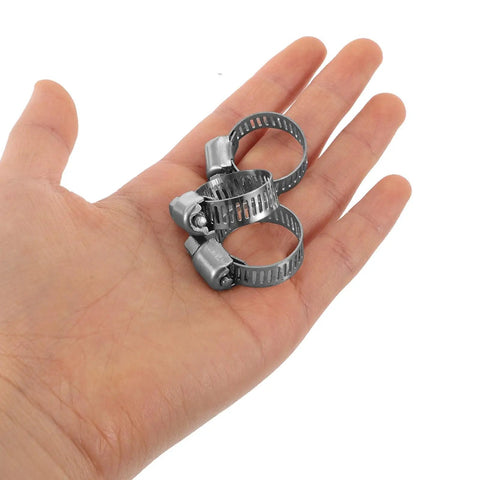 Heavy Duty 10 Pack Steel Hose Clamp Kit With Worm Gear Fastening For Auto Water Pipes, Reliable Versatile Pipe Clamps Built Tough To Secure Fluid Lines And Mechanical Fitters Like A Pro. Steel worm gear hose clamps in hand