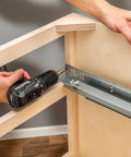Installing Top Shelf 21 Inch Undermount Drawer Slides with drill, showing smooth glide and soft close mechanism.