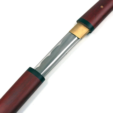 Close-up of Handmade Japanese Shirasaya Samurai Katana Sword with full tang razor sharp carbon steel blade and dark wood handle.