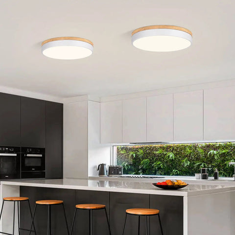 Modern kitchen with two Dimmable Wood LED Flush Mount Ceiling Light With Five CCTs 2700K To 6000K Modern Round Close To Ceiling Fixture In White Minimalist Ceiling Lamp For Living Room Bedroom And Laundry Room installed on ceiling.