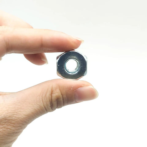 Close-up of a bar nut from Six Pack Chainsaw Sprocket Cover And Bar Nut Pro Grade Replacement Kit For MS Series