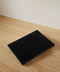 4 Pack Black Hard Foam Blocks 405x305x25mm Shipping Padding Sheets for Packaging Protection on wooden surface