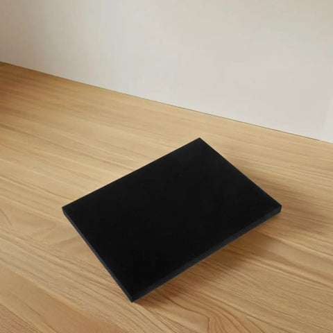 4 Pack Black Hard Foam Blocks 405x305x25mm Shipping Padding Sheets for Packaging Protection on wooden surface