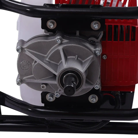 Close-up of Workhorse Gas Powered Post Hole Digger's metal gear housing and engine detail with red casing.
