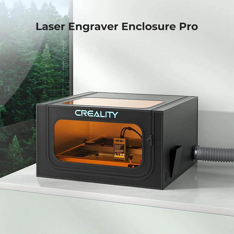 Creality Laser Engraver Enclosure Pro front view with black enclosure and orange-lit viewing window