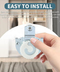 4 Pieces Sliding Closet Door Rollers Set With Eight Screws For Top Hung Wardrobe Sliding Doors Hardware shown in hand