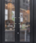 Glass door equipped with 2 Pack 90 Degree Offset Door Pulls In Stainless Steel For Cabinets With Screws Center To Center 6.3 Inches And 0.39 Inch Diameter