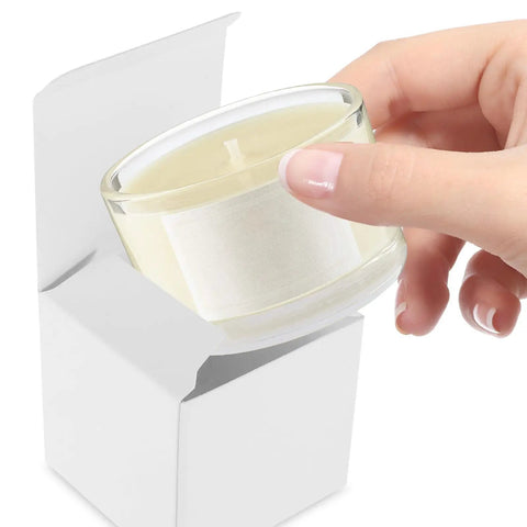 Person placing candle into White Square Cardboard Boxes Set Of 10 Easy Assembly Packaging Boxes For Essential Oils Coffee Cups Candles And Gifts