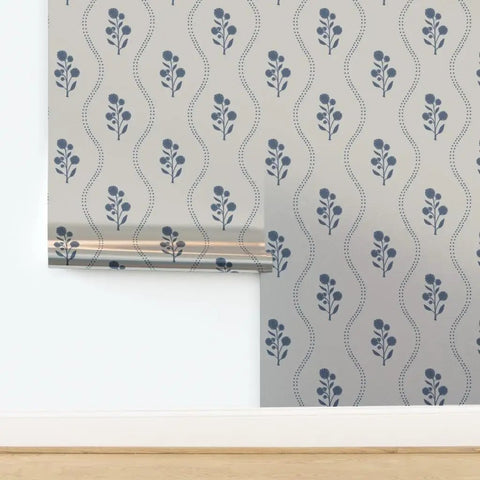 Kick Up Walls With Cottage Floral Blue And Silver Metallic Wallpaper Featuring Slick Fibrous Texture And Glamorous Shine on a smooth wall.