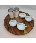 Handmade 17 Inch Lazy Susan Turntable With Resin Finish for kitchen organization, featuring tea cups and jars