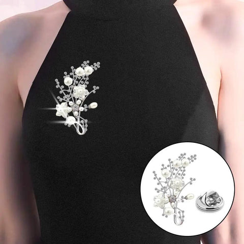 50 Piece Bulk Haul Of Top Shelf Metal Pin Backs Featuring Grip Tight Locking Clasps Perfect For Custom Lapel Pins And Enamel Badges. Decorative floral design with pearls, attached to a black garment.