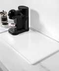 Silicone Coffee Mat 12 By 19 Inches, Waterproof Raised Edge Bar Mat For Espresso Station And Coffee Bar Accessories on counter