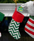 Santa placing Heavy Duty White Duct Tape 3 Pack in stocking, three festively patterned stockings on mantel, Christmas theme.