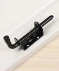 Heavy Duty Sliding Bolt Latch Featuring Spring Loaded Pin Crafted From Premium 304 Stainless Steel on a wooden surface.