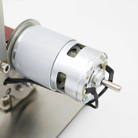 Close-up of powerful motor in the Compact Electric Mini Belt Sander Bench Polisher With Adjustable Speed For Metal Woodwork.
