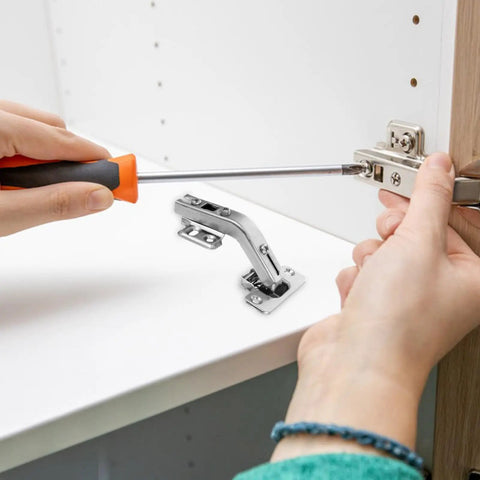 Installing stainless steel cabinet door hinges 4 pack for easy DIY install 135 degree hidden corner hinges on white cabinet.