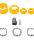 Components of the Heavy Duty Electric Drill Pipe Threader Kit including yellow fittings, dies, and a metal tool for pipe threading.