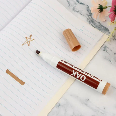 Oak color wood repair marker on paper, cap off, showing ink color; Wood Repair Markers Touch Up Kit For Stains And Scratches On Wooden Floors