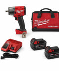 Hard Hitting Brushless Impact Wrench With Friction Ring Unleashes Knockout 1400 Foot Pounds Of Torque For Swift Socket Swaps And Beefy Fastening Tasks Compact 18 Volt Cordless Power Tool Built Like A Tank For Real World Applications with two batteries, charger and carrying case.