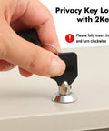Hand inserting key into Beefy Fireproof Safe Box With Key Lock For Valuables And Documents, Tough As Nails Fire Resistant Lockbox.