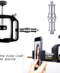 Four Piece Aluminum Pro Grade One Quarter To Three Eighths Inch Threaded Adapter Set for tripods and accessories on desk mount.