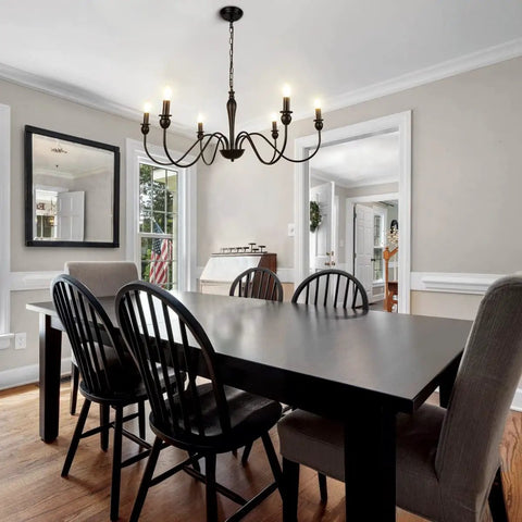 Dining room with Six Light Black Modern Farmhouse Chandelier With Rustic Vintage Candle Iron Arms In Matte Black Finish