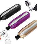 Front view of 3-pack eyeglass cleaner pens in black, purple, and gold with built-in brush for travel
