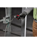 Automatic Wire Stripper Cutter for Quick One-Handed Insulation Removal Up To 1 Inch in use by technician at electrical panel