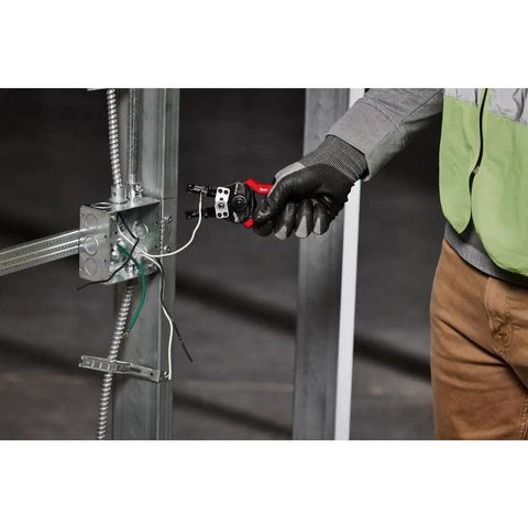 Automatic Wire Stripper Cutter for Quick One-Handed Insulation Removal Up To 1 Inch in use by technician at electrical panel
