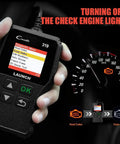Hand holding OBD2 Scanner CR319 Full OBD2 Functions Code Reader For Check Engine Light displaying diagnostic menu.