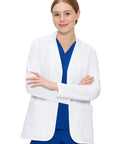 Woman wearing Women Lab Coat With Three Pockets Hip Length Long Sleeve White Pro Grade Coat For Medical Pros Lightweight Breathable Polyester Blend