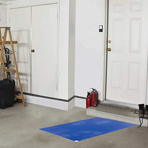Sticky Mats For Clean Rooms Blue 24 By 36 Inches Walk Off Tacky Mats For Construction Home Lab Pet Garage Warehouse Floors 4 Pads With 30 Sheets Each Includes in a garage setting, placed near a door to capture dust from shoes.
