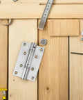 Stainless Steel Self Closing Automatic Return Door Hinges Spring Loaded Hidden Door Hardware on wooden surface