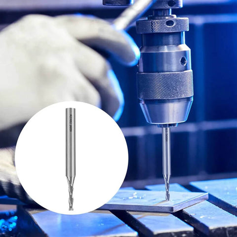 End mill set; 5 pieces, 1/8 inch diameter HSS four-flute cutter with 1/4 inch shank, shown mounted in CNC spindle