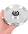 Hand holding Heavy Duty Aluminum Cable Pulley Wheel for Gym Gear and Clotheslines 115mm Diameter Silent Operation With Sturdy Bearings 551lb Load