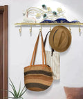 Slick Wall Mounted Coat Rack For Entryway Essentials With Sturdy Rustic Hooks holding bags and hats in a stylish entryway.