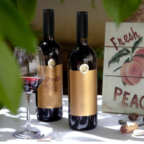 Solid As A Rock Heat Shrink Wine Caps, 150 Pack Black Bottle Sleeves For Home Cellar Projects, No Sweat Tear Off Wrap that adorns red wine bottles with a sleek finish.