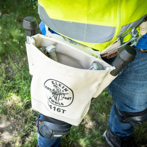 Person wearing Heavy Duty No 4 Canvas Tool Bag With Bull Pin And Bolt Pouch For Rigs, 5 By 10 By 9 Inch, on belt at jobsite