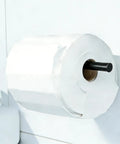 Pet Proof Toilet Paper Holder Cover Fits Mega And Standard Rolls, white unit mounted on wall with black rod and pot plant.