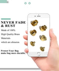 Hella Durable Gold Brass Rivet Studs For Handbags And Purses Heavy Duty Screw Back Feet half inch in hand, showcasing various designs.