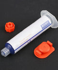 Syringe of No Clean Solder Flux Paste for PCB and BGA Repair with orange caps, perfect for multilayer assembly fixes.
