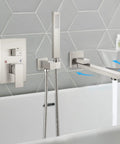 Wall Mounted Tub Filler With Handheld Shower Sprayer No Fuss Dual Function Tub Spout And 2In1 Diverter in brushed nickel over tub.