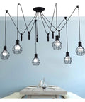 Straight Up Retro Industrial Chandelier With Working Pulley Cord Dope Black Metal Shade, seven pendant lights over a dining table.