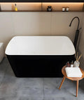 Premium Freestanding Acrylic Oval Soaking Bathtub 67 Inch Deep Soak Basin with sleek design and black exterior view.