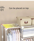 Portable Fabric Wardrobe Steel Frame Foldable Closet Organizer Dustproof Waterproof Heavy Duty Thick Nylon Storage Cabinet Room Divider showing storage bins on top and hanging clothes.