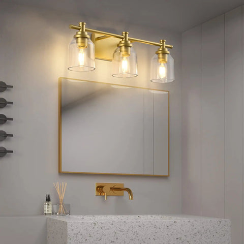 Gold Three Light Bathroom Vanity Light Fixture Over Mirror Vintage Style Wall Light With Easy Fifteen Minute Install Retro Farmhouse Vibe Gold Finish Compatible With LED Incandescent CFL And Halogen Durable Back Plate above a bathroom mirror
