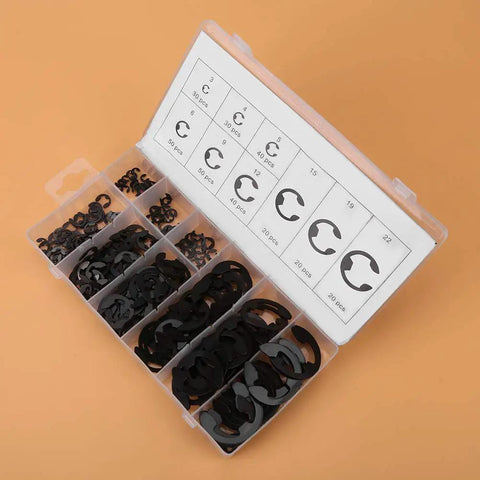 Open box of Black Metal E Clip Set For Shafts 3mm To 22mm 300 Piece Assortment Of Retaining Rings With Calibrated Sizes, visible sizes listed