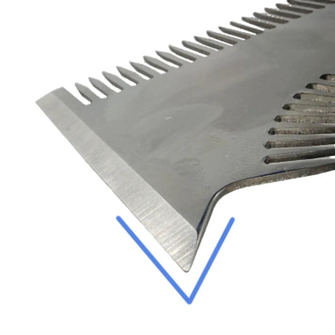 Close-up of the blade edge of The Smooth Operator All In One Paint Brush And Roller Cleaning Tool for scraping paint.