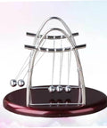 Newton's Cradle Pendulum Dynamics Learning Kit for Hands On Education and Large Desk Decor with five swinging balls on a wooden base